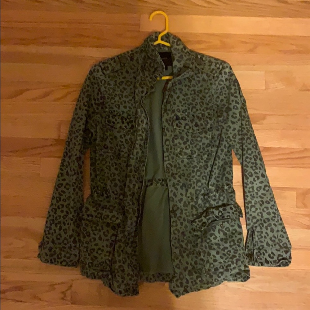 Green cheetah print “rain jacket”
